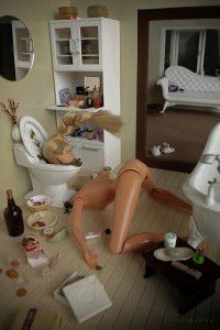 barbie by the toilet